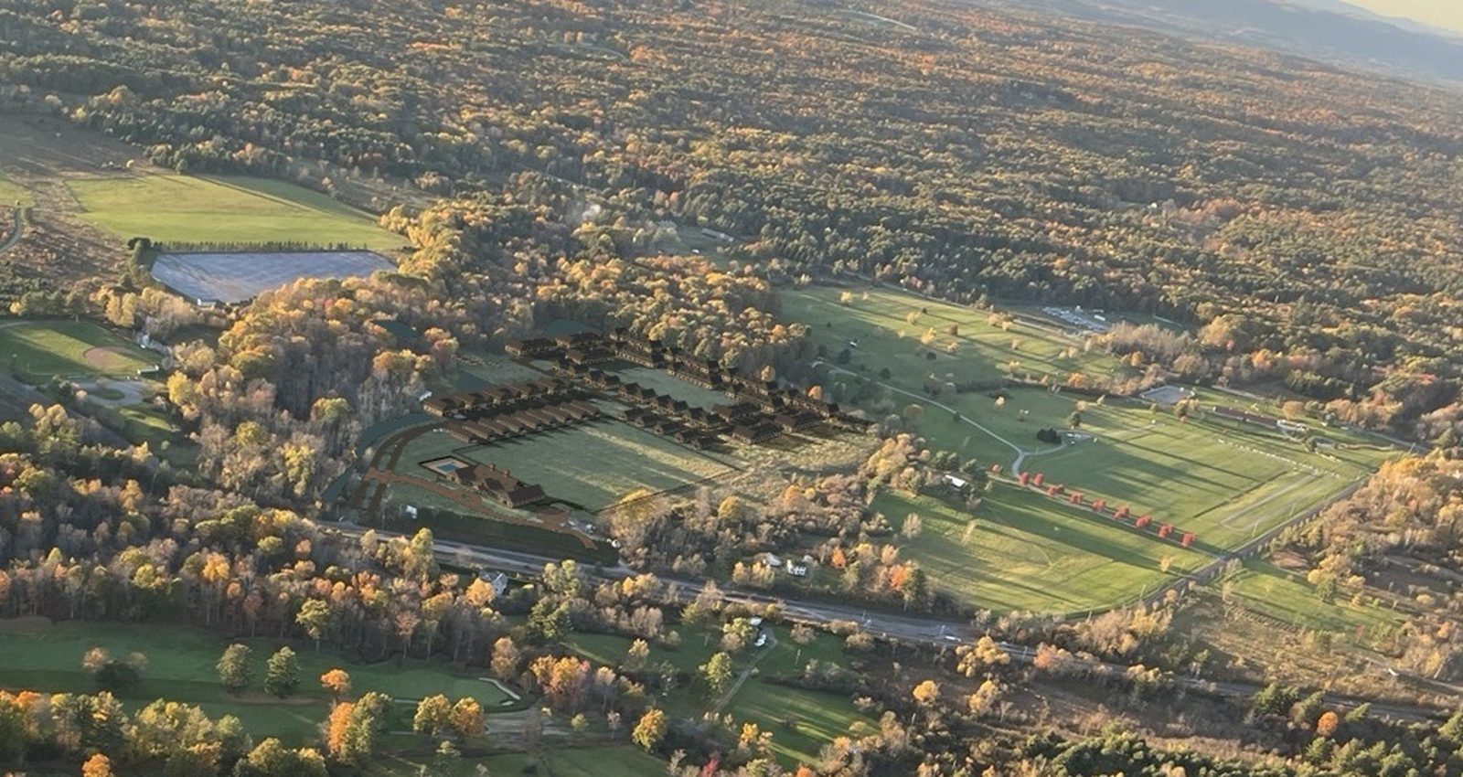 Aerial looking north with proposed buildings